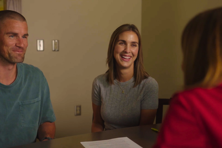 Members smiling with lending specialist